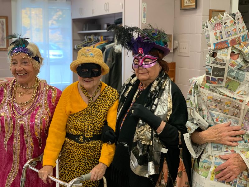 Women in costume masks