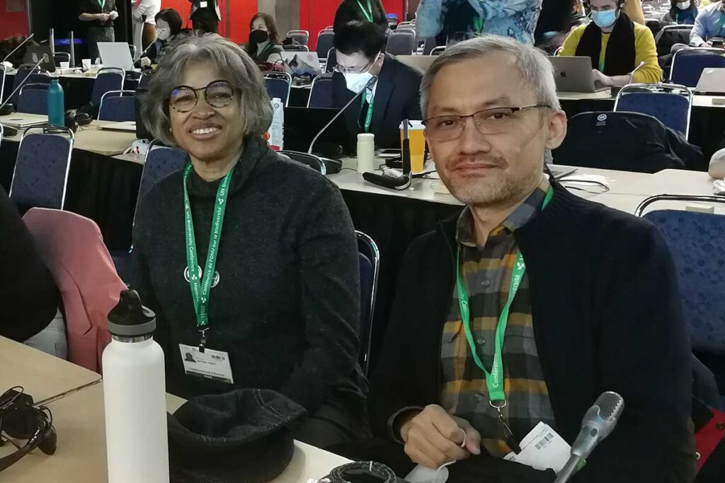 Michele and Samuel Chiu sitting in the plenary hall.